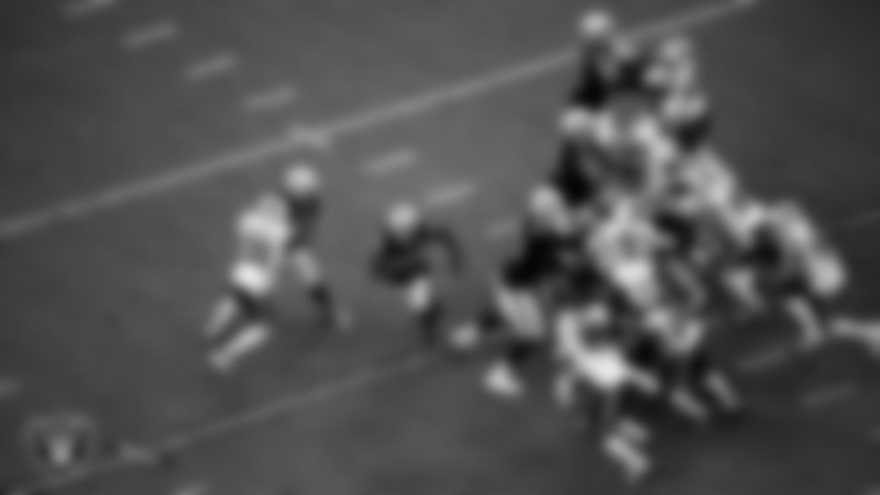 Las Vegas Raiders running back Josh Jacobs (28) rushes as tight end Darren Waller (83), guard Gabe Jackson (66), tackle Sam Young (70), center Rodney Hudson (61), tackle Denzelle Good (71) and tackle Kolton Miller (74) and tight end Jason Witten (82) block during the regular season home game against the Buffalo Bills.
