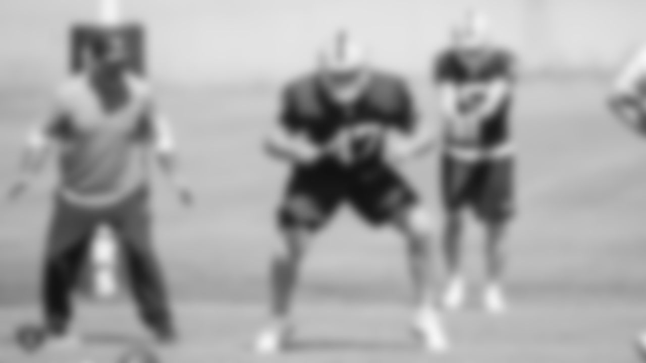 Oakland Raiders assistant head coach and special teams coordinator Rich Bisaacia and long snapper Trent Sieg (47) on the field for practice at the Oakland Raiders Practice Facility, Thursday, September 20, 2018, in Alameda, California.