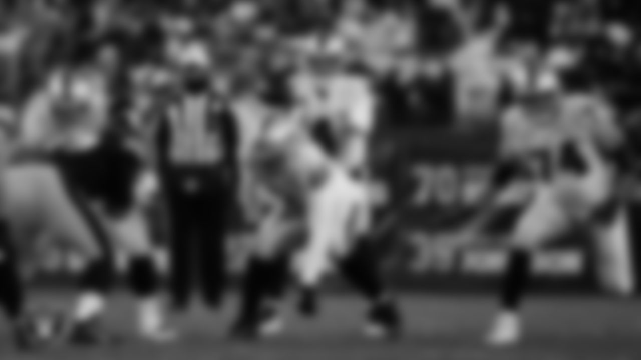 Las Vegas Raiders quarterback Derek Carr (4) receives the snap during the regular season away game against the Pittsburgh Steelers at Acrisure Stadium.