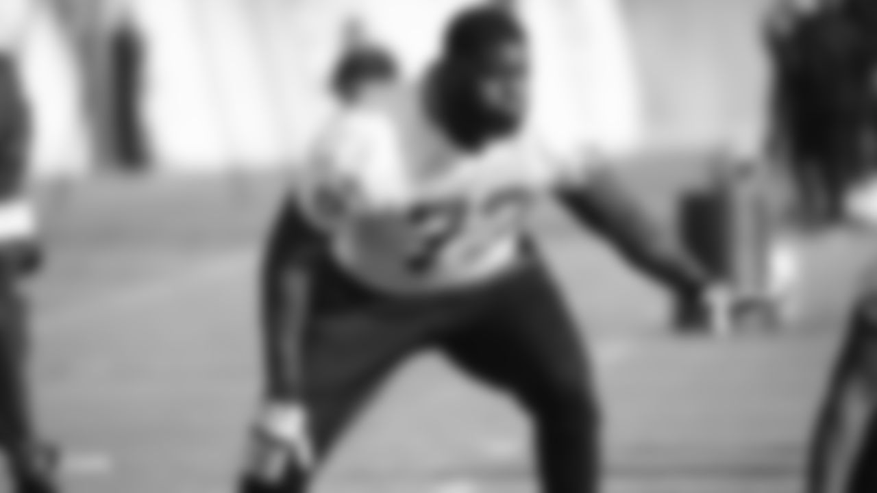 Raiders tackle David Sharpe (72) goes to block during practice.
