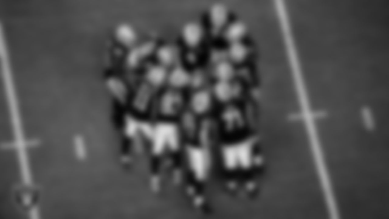 Las Vegas Raiders quarterback Derek Carr (4) calls a play in the huddle during the regular season home game against the New Orleans Saints.