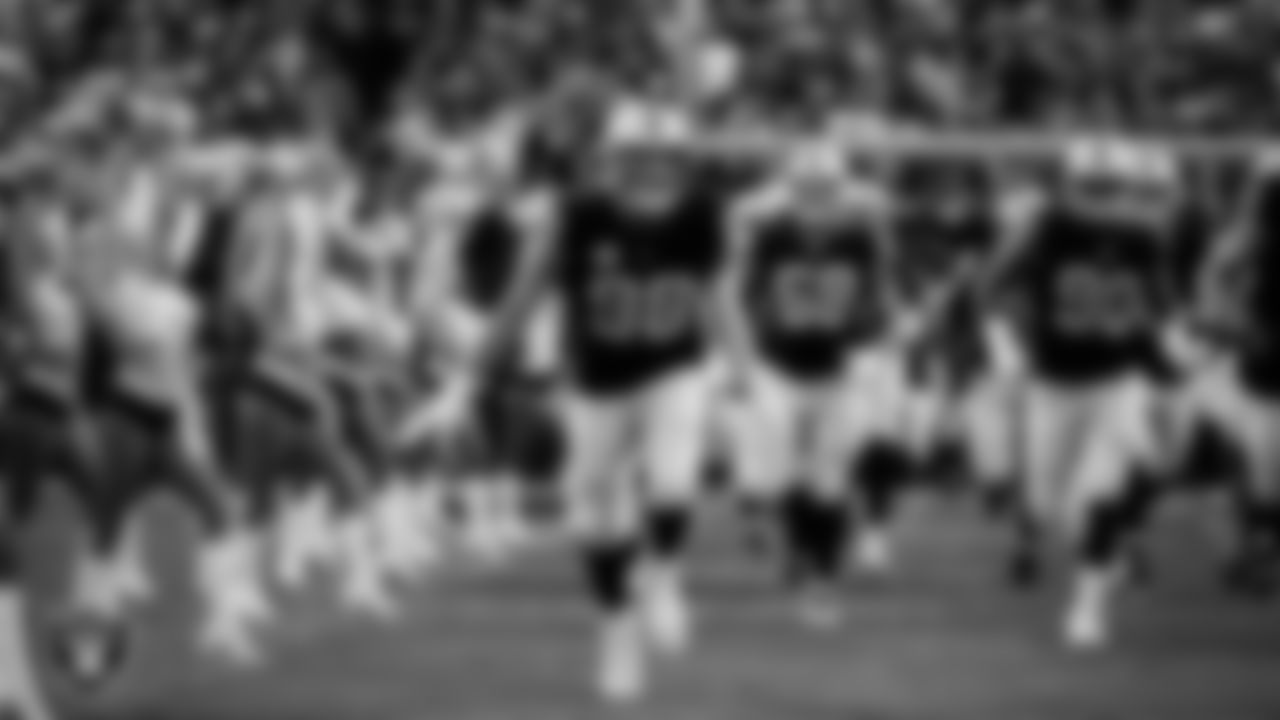 Las Vegas Raiders defensive end Maxx Crosby (98) as the team is introduced onto the field before their regular season home game against the Pittsburgh Steelers at Allegiant Stadium.