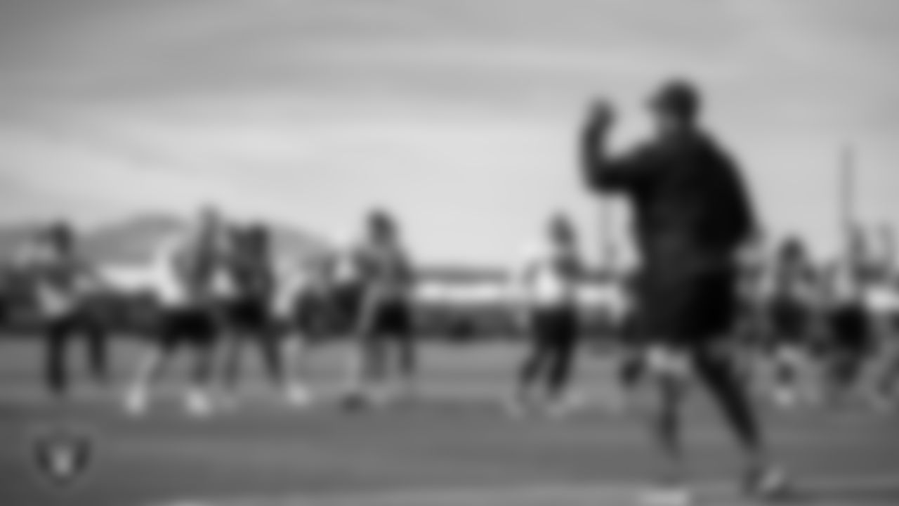 Las Vegas Raiders players and coaches at a workout during phase two of the offseason program.