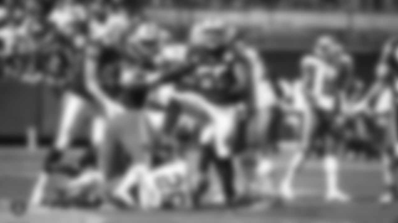 Raiders linebacker Vontaze Burfict (55) celebrates after making a tackle during the Raiders regular season game against the Kansas City Chiefs.