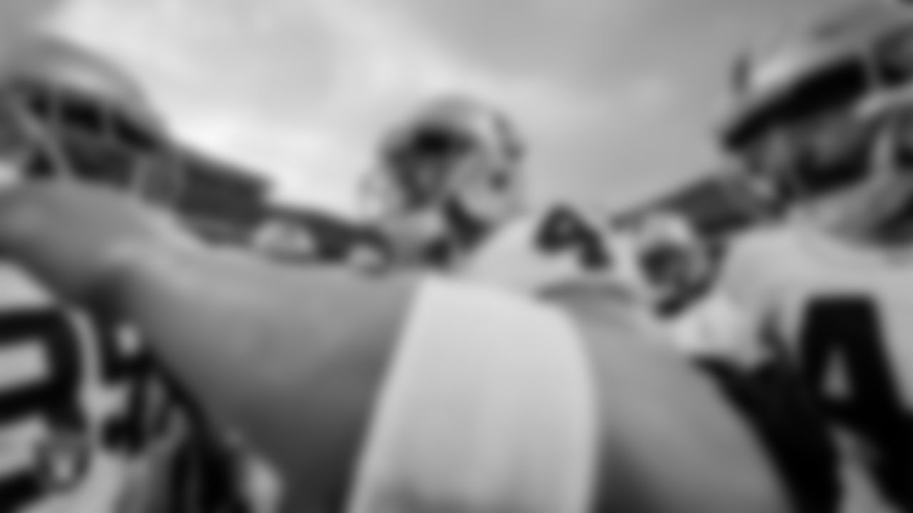 Las Vegas Raiders quarterback Derek Carr (4) fires up the team in a huddle during warm ups before the regular season away game against the Kansas City Chiefs at GEHA Field at Arrowhead Stadium.