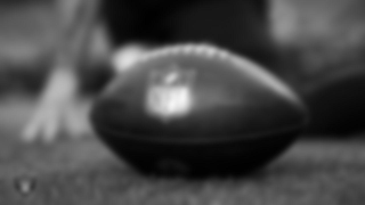A Las Vegas Raiders football on the field before the regular season home game against the Washington Football Team.
