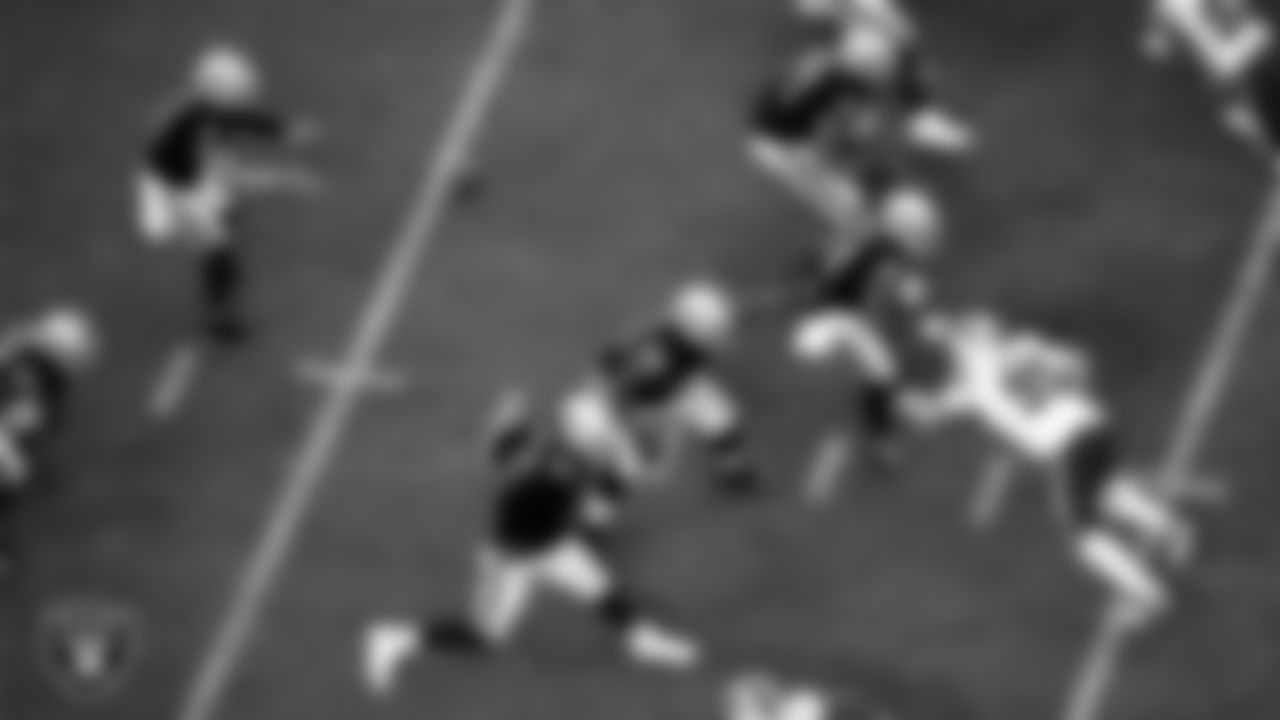 Las Vegas Raiders quarterback Derek Carr (4) takes the snap as tackle Sam Young (70), guard Gabe Jackson (66), center Rodney Hudson (61) and tackle Denzelle Good (71) block during the regular season home game against the Buffalo Bills.