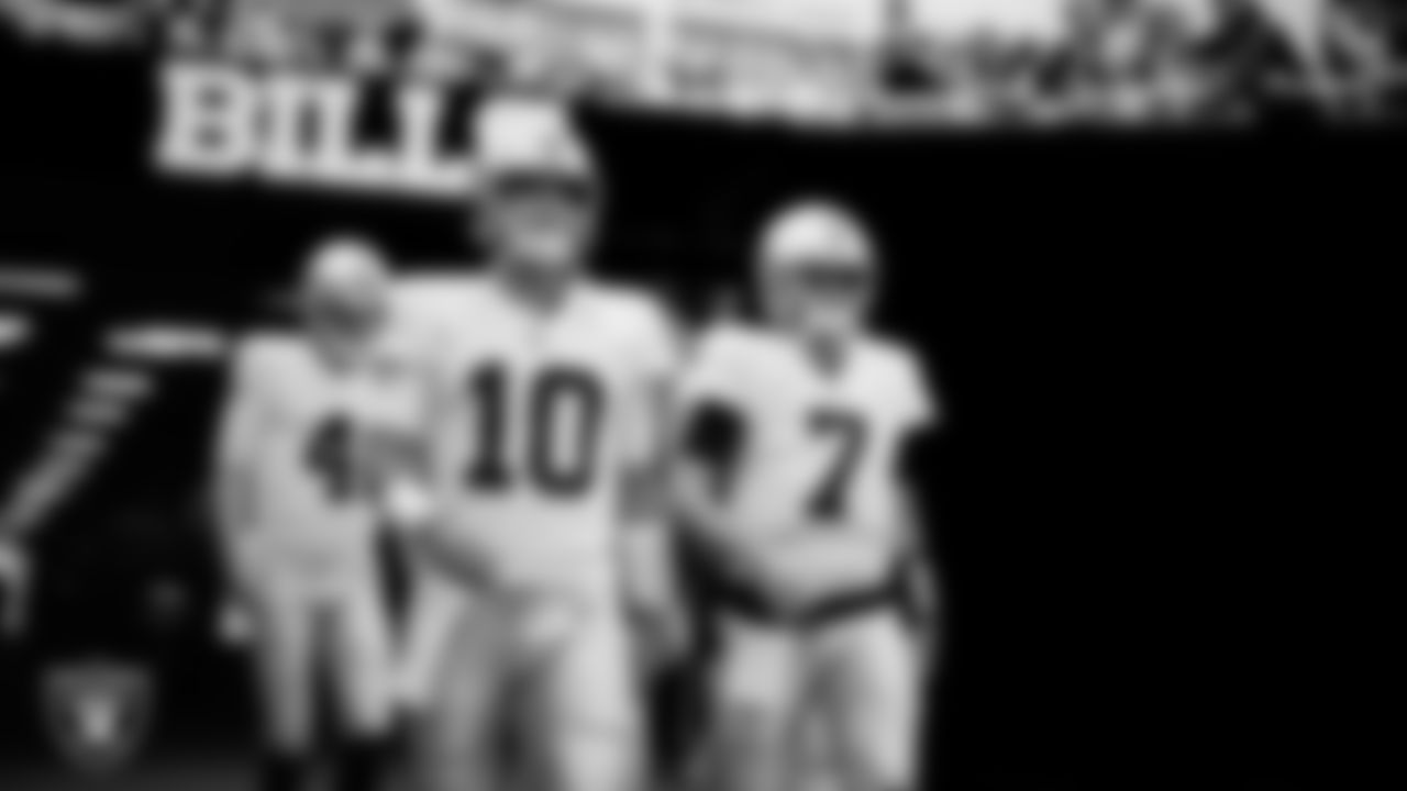 Las Vegas Raiders quarterback Jimmy Garoppolo (10) and quarterback Brian Hoyer (7) walk down the tunnel before the regular season away game against the Buffalo Bills at Highmark Stadium.