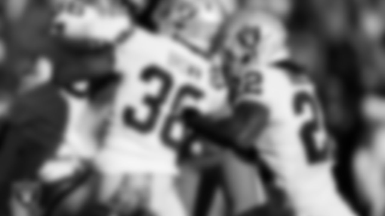Las Vegas Raiders running back Ameer Abdullah (22) returns a kickoff during the regular season away game against the Denver Broncos at Empower Field at Mile High.