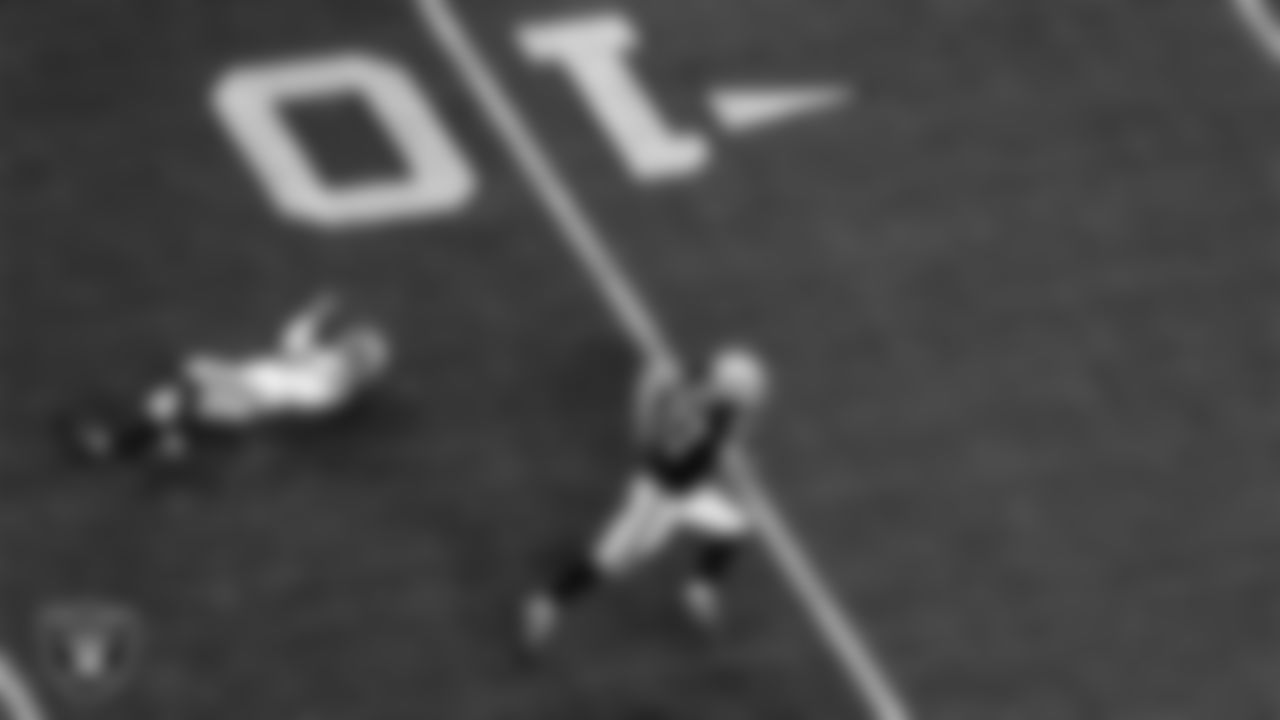 Las Vegas Raiders tight end Foster Moreau (87) heads to the end zone on a 47-yard touchdown catch during the regular season home game against the Indianapolis Colts.