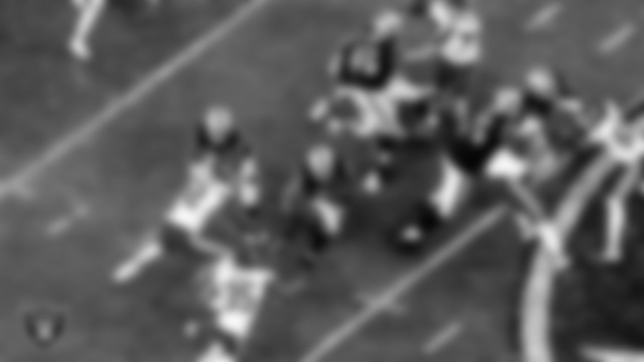 Las Vegas Raiders running back Devontae Booker (23) rushes during the regular season home game against the Kansas City Chiefs.