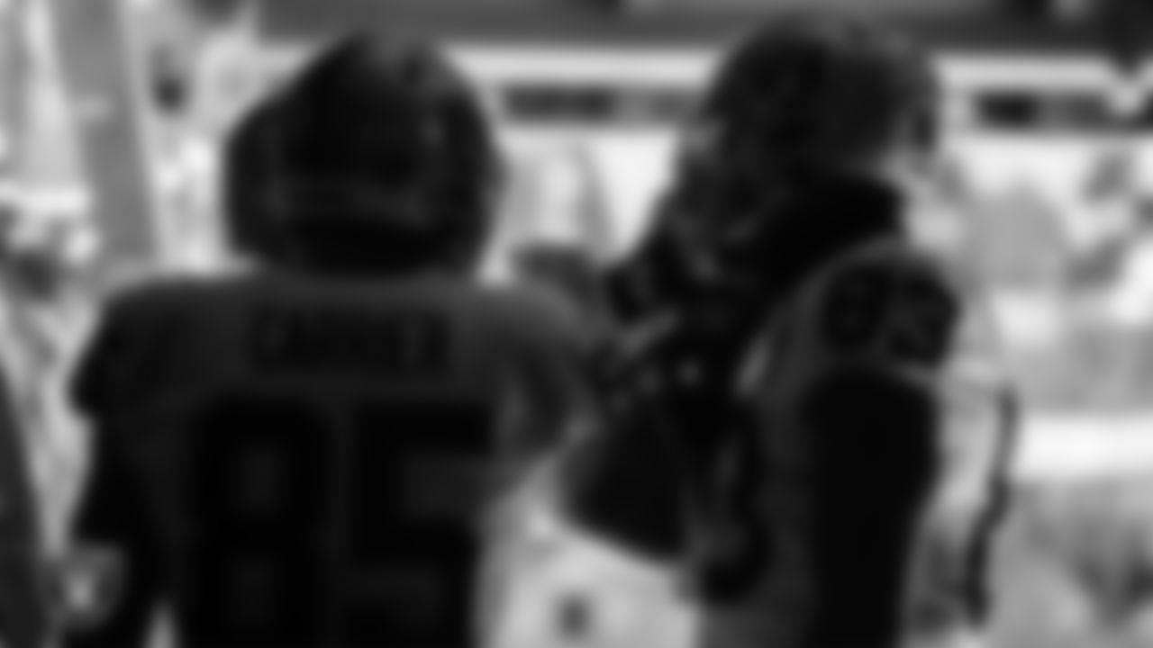 The Las Vegas Raiders tight ends huddle in the tunnel before the regular season away game against the New York Jets at MetLife Stadium.