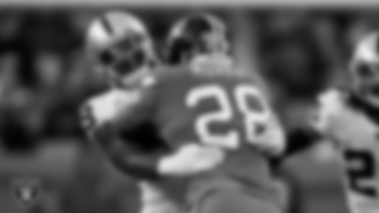 Las Vegas Raiders defensive end Clelin Ferrell (99) makes a tackle during the regular season away game against the Denver Broncos at Empower Field at Mile High.