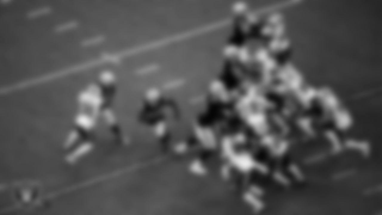 Las Vegas Raiders running back Josh Jacobs (28) rushes as tight end Darren Waller (83), guard Gabe Jackson (66), tackle Sam Young (70), center Rodney Hudson (61), tackle Denzelle Good (71), tackle Kolton Miller (74) and tight end Jason Witten (82) block during the regular season home game against the Buffalo Bills.