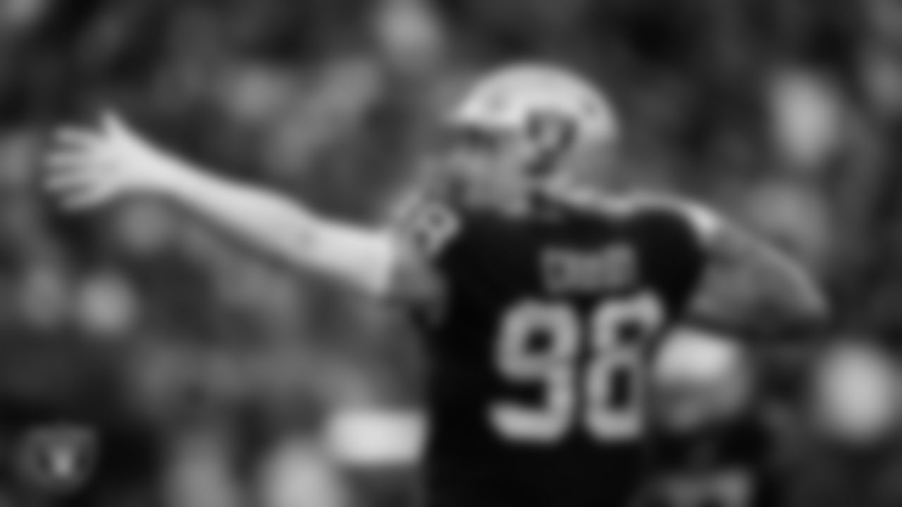 Las Vegas Raiders defensive end Maxx Crosby (98) celebrates after sacking the quarterback during the regular season home game against the Baltimore Ravens.