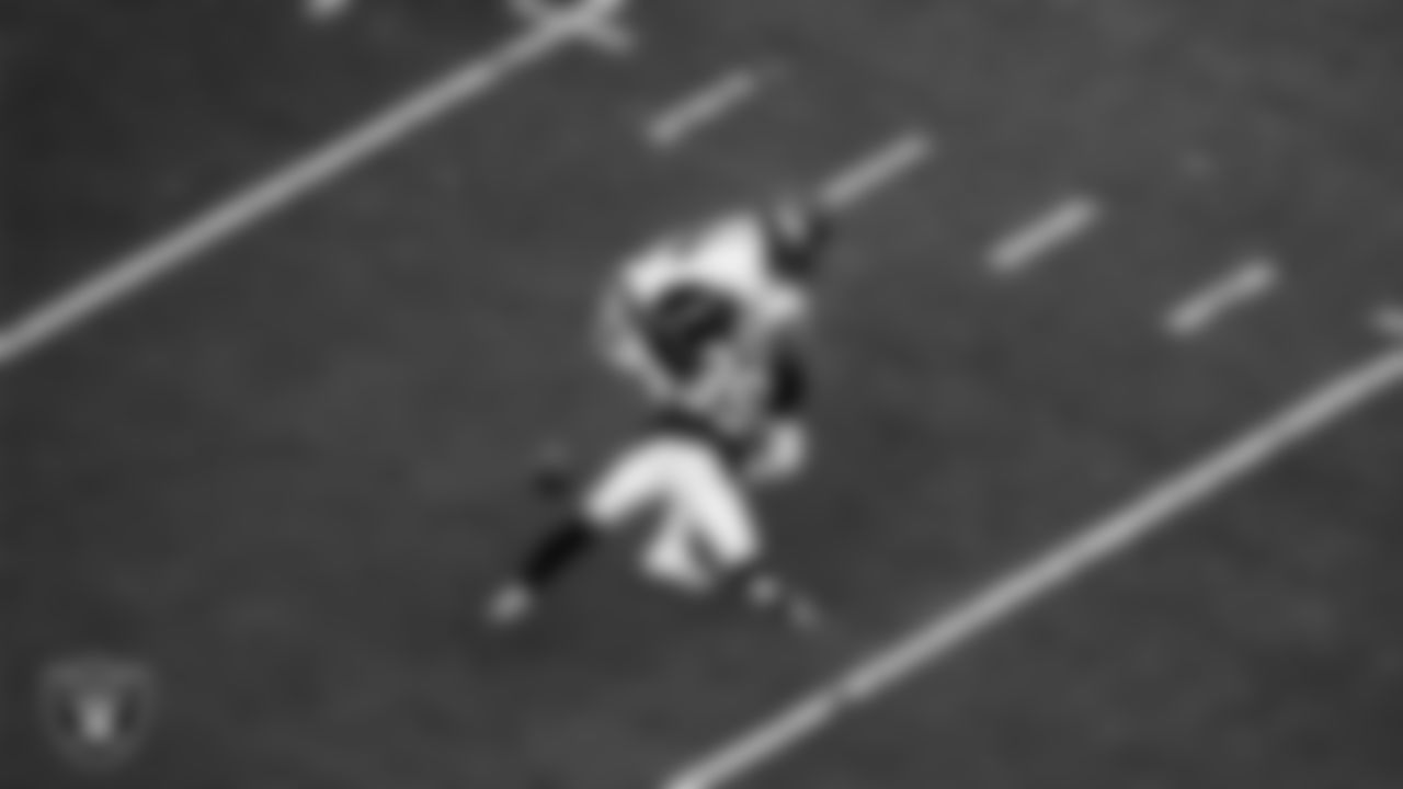 Las Vegas Raiders cornerback Nate Hobbs (39) breaks up a pass during the regular season home game against the Denver Broncos at Allegiant Stadium.