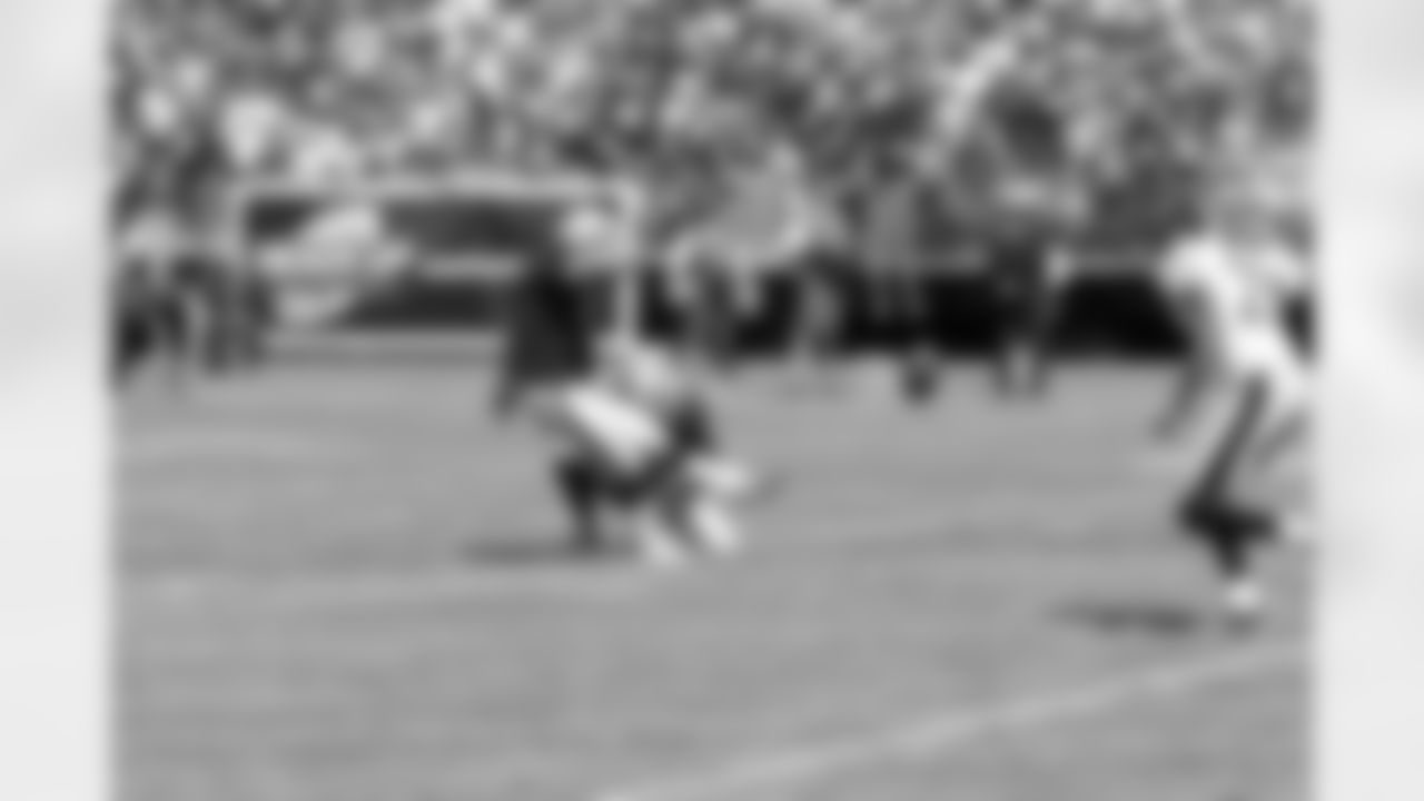 K Sebastian Janikowski kicks an extra point.