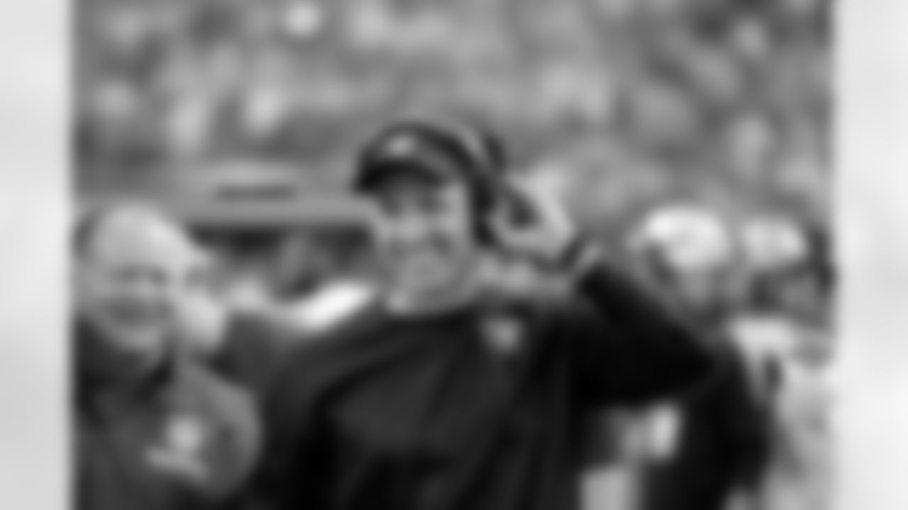 Head Coach Dennis Allen breaks out a smile on the sideline.