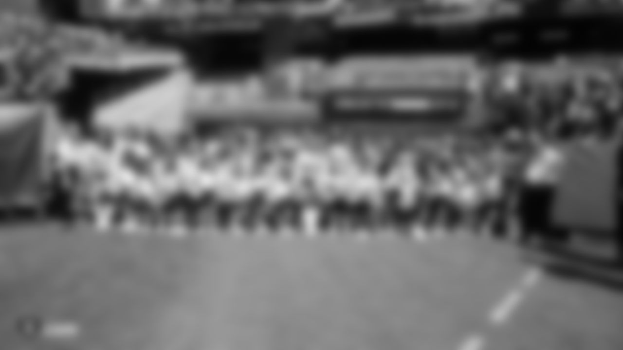 The Raiderettes and Junior Raiderettes before the Raiders game against the Los Angeles Rams.