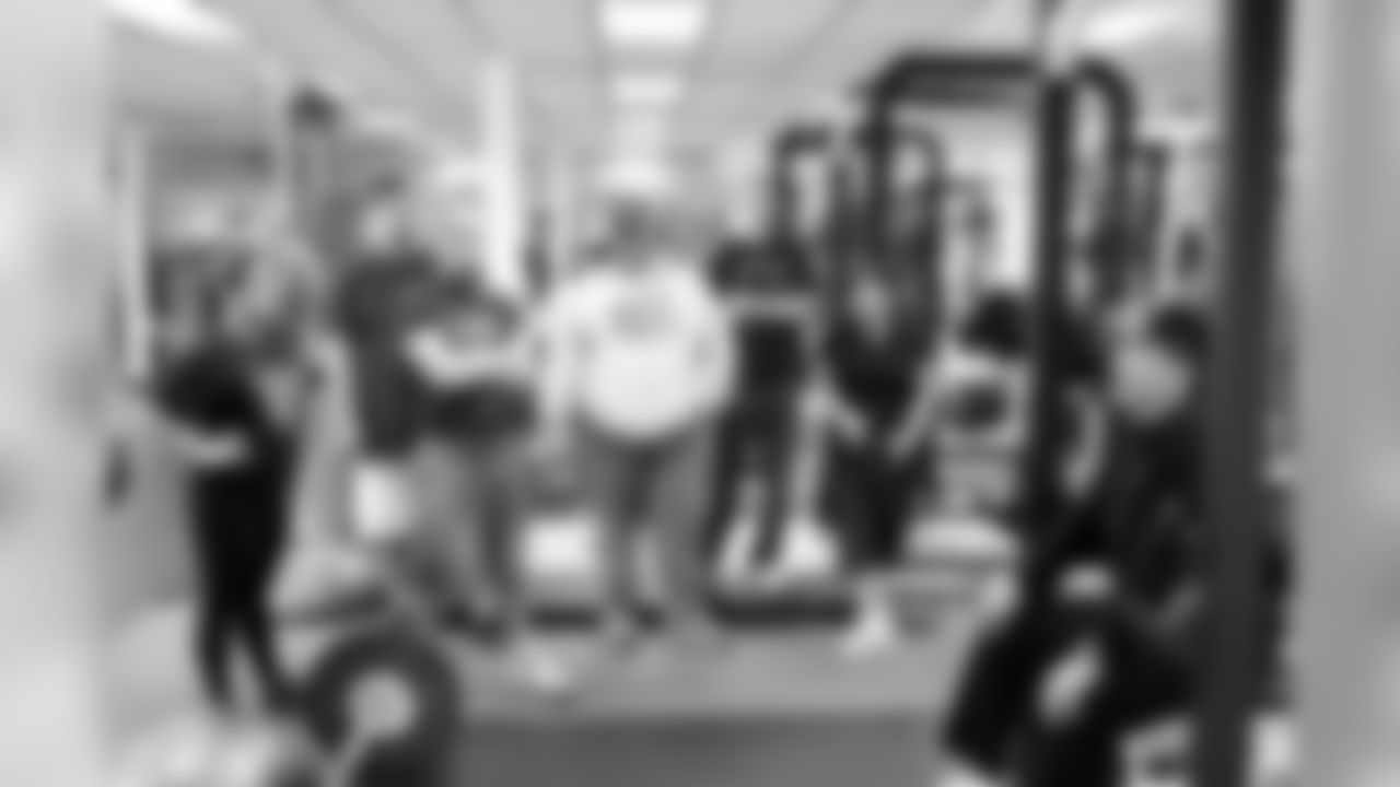 Strength and conditioning coach Brad Roll explains some of the finer points of the weight room. Photo by Tony Gonzales
