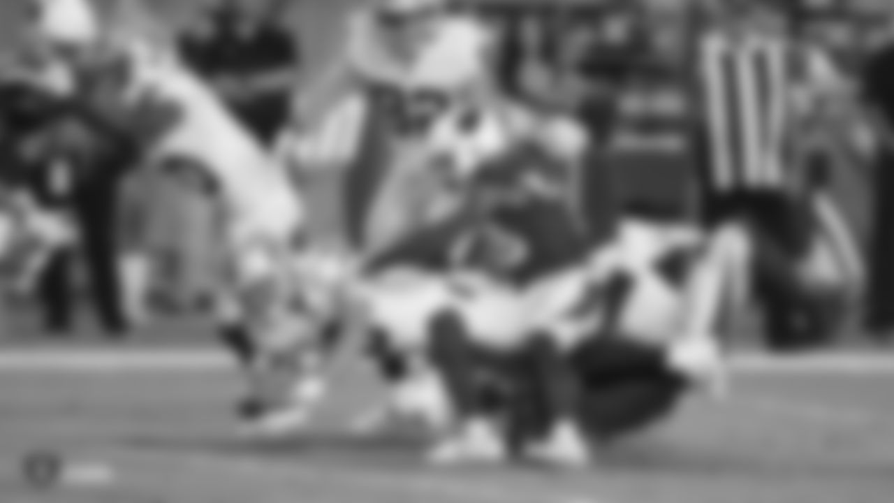 Raiders quarterback Nathan Peterman (3) rushes during the Raiders preseason game against the Arizona Cardinals.