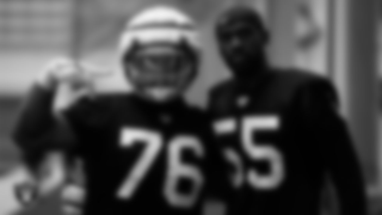 Las Vegas Raiders defensive tackle Kyle Peko (76) and defensive end Chandler Jones (55) on the field for practice at 2023 Training Camp at Intermountain Health Performance Center.