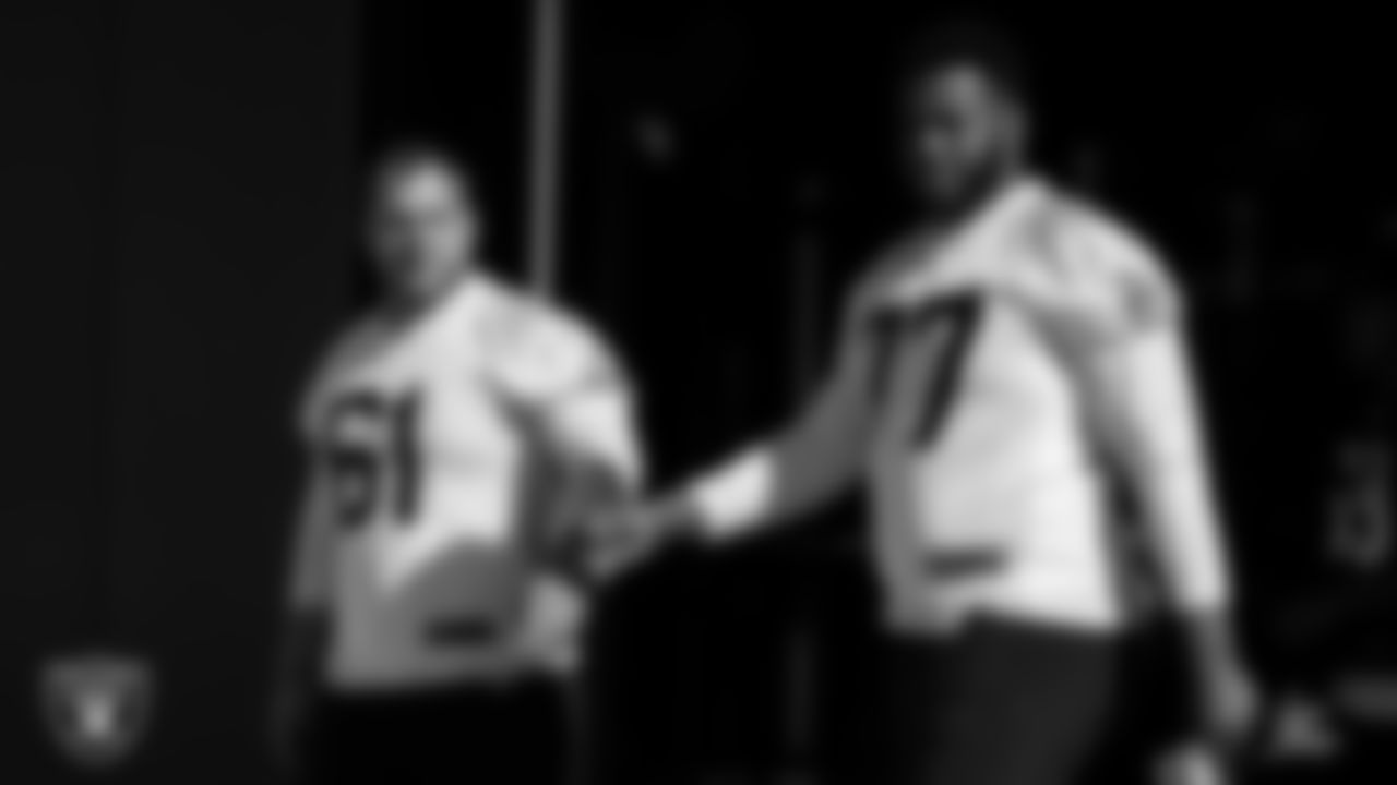 Las Vegas Raiders offensive lineman Jordan Meredith (61) and tackle Thayer Munford Jr. (77) at a workout during phase two of the offseason program.