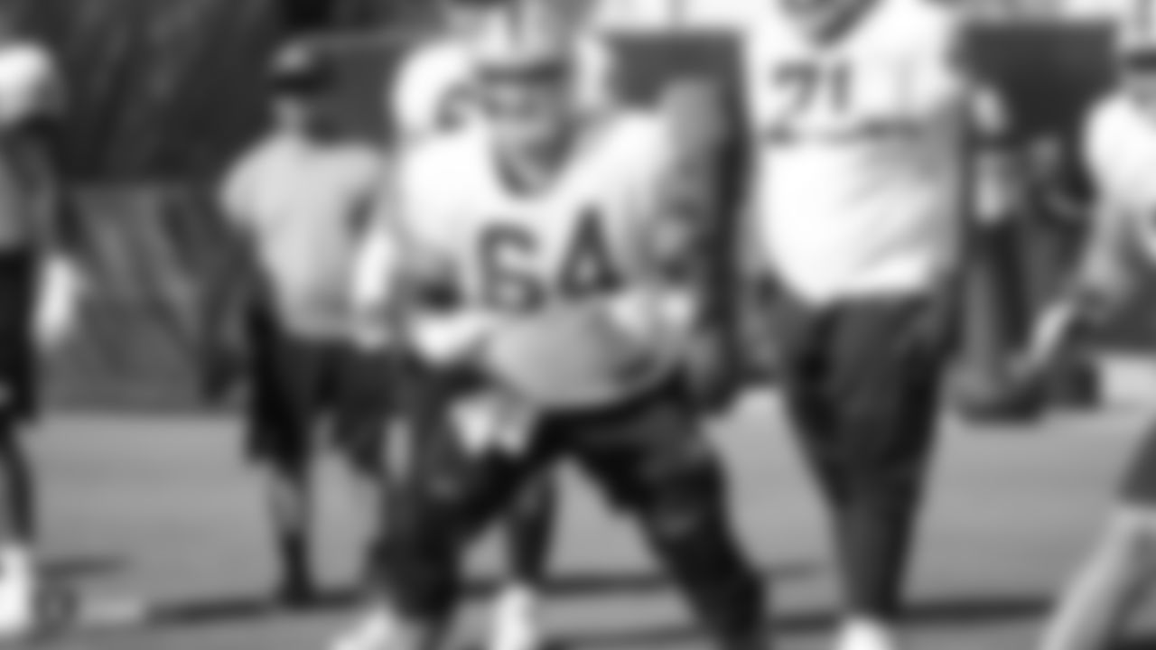 Raiders guard Richie Incognito (64) goes through offensive drills during practice.