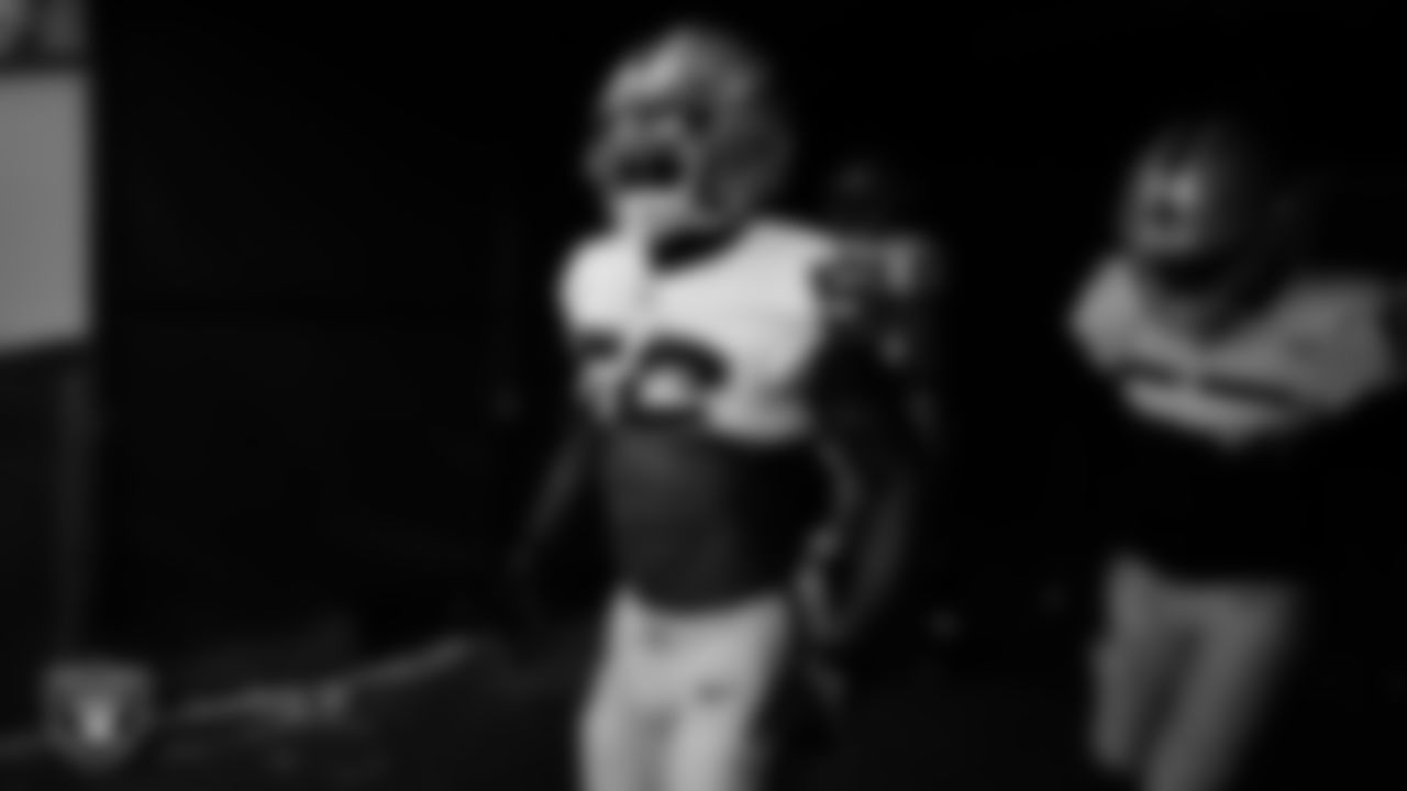 Las Vegas Raiders linebacker Denzel Perryman (52) walks down the tunnel before the regular season away game against the Denver Broncos at Empower Field at Mile High.