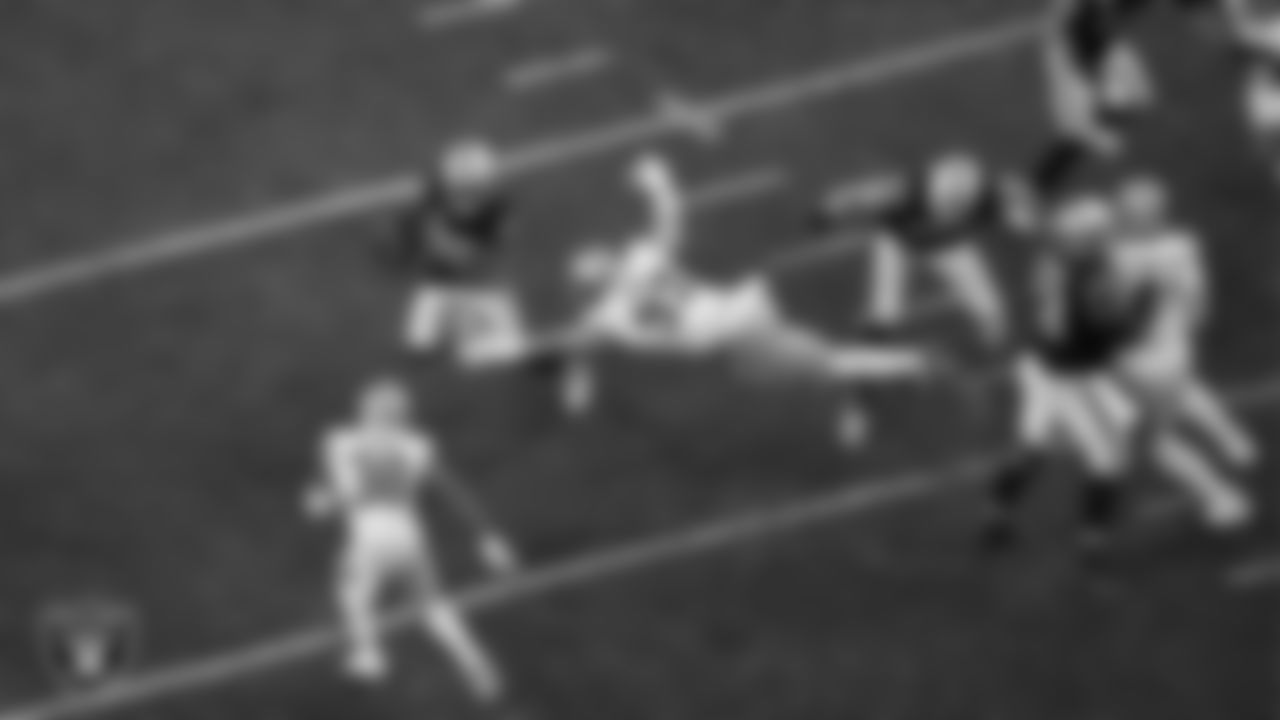 Las Vegas Raiders running back Josh Jacobs (28) rushes during the regular season home game against the San Francisco 49ers at Allegiant Stadium.