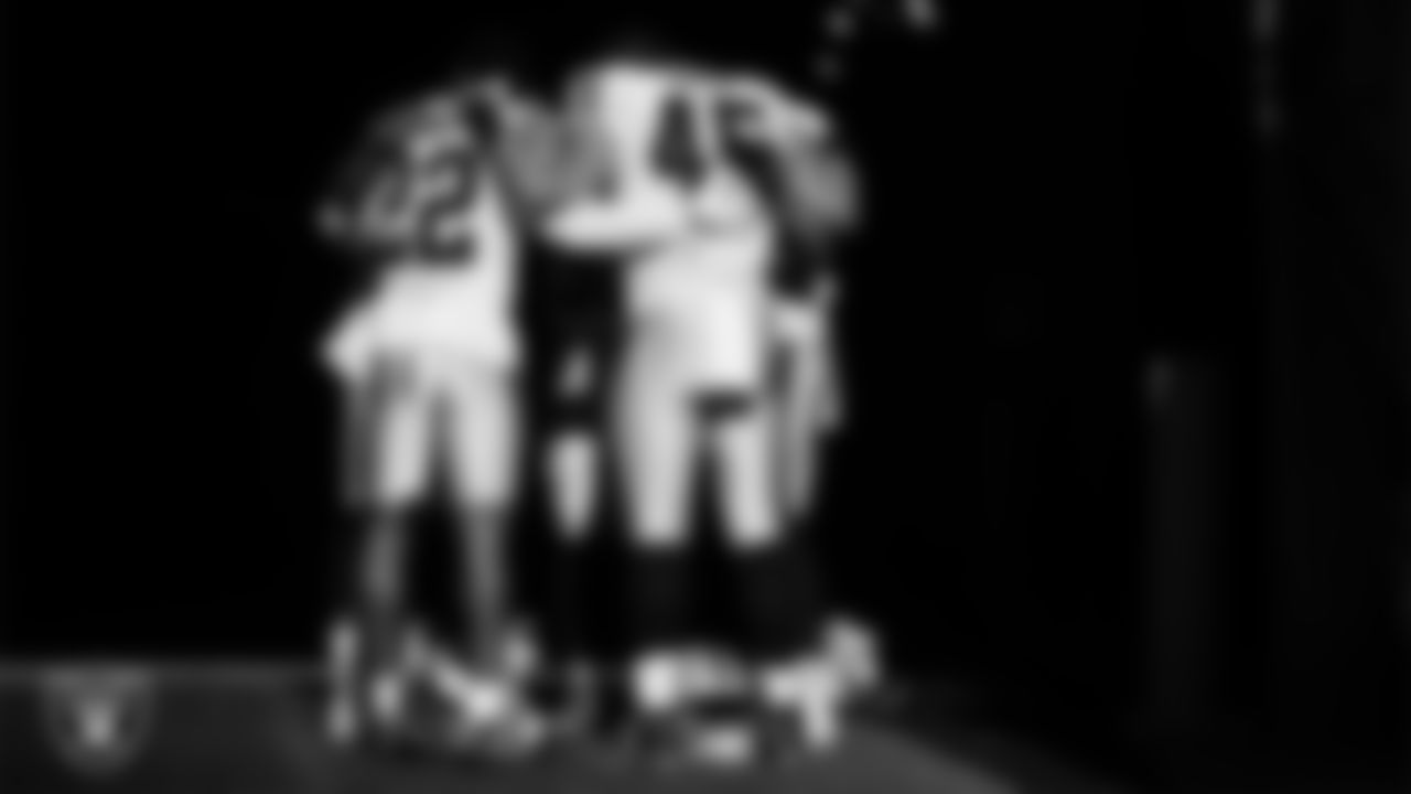 The Las Vegas Raiders special teams returners huddle in the tunnel before the regular season away game against the New York Jets at MetLife Stadium.