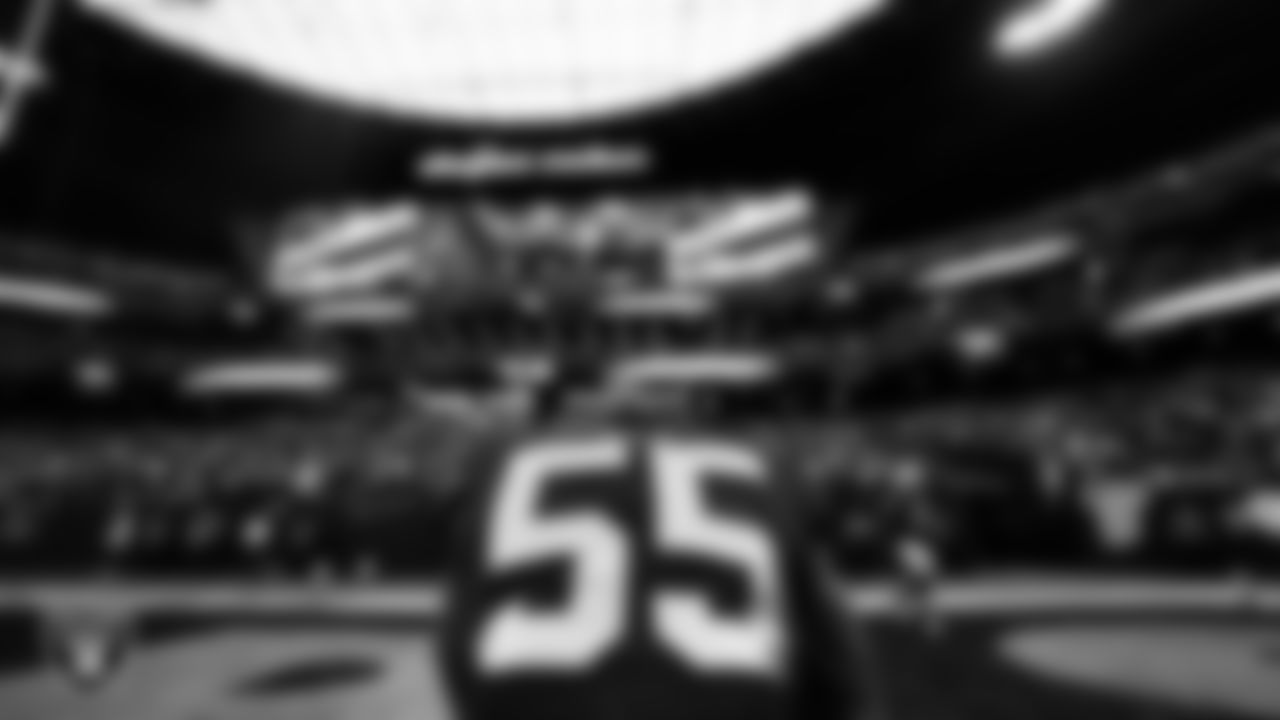 Las Vegas Raiders linebacker Marquel Lee (55) kneels in the end zone before the regular season home game against the Washington Football Team.