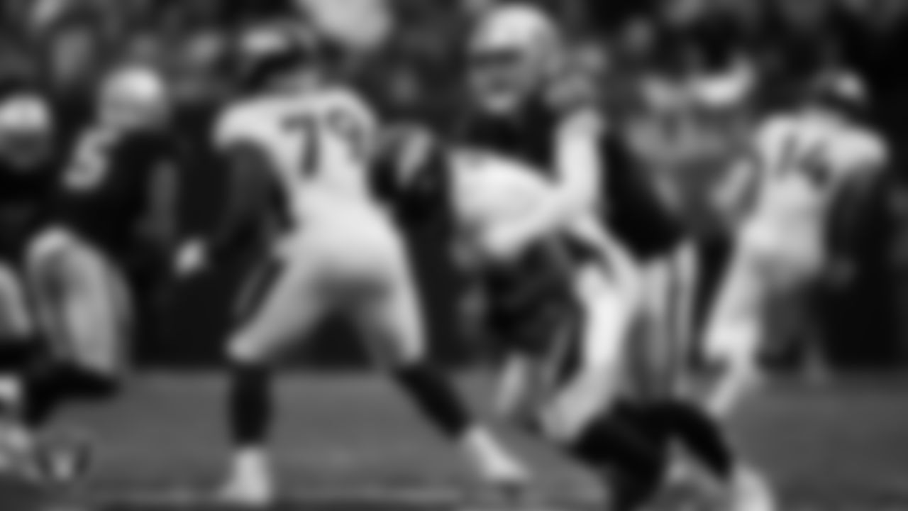 Las Vegas Raiders defensive end Maxx Crosby (98) sacks the quarterback during the regular season home game against the Denver Broncos at Allegiant Stadium.