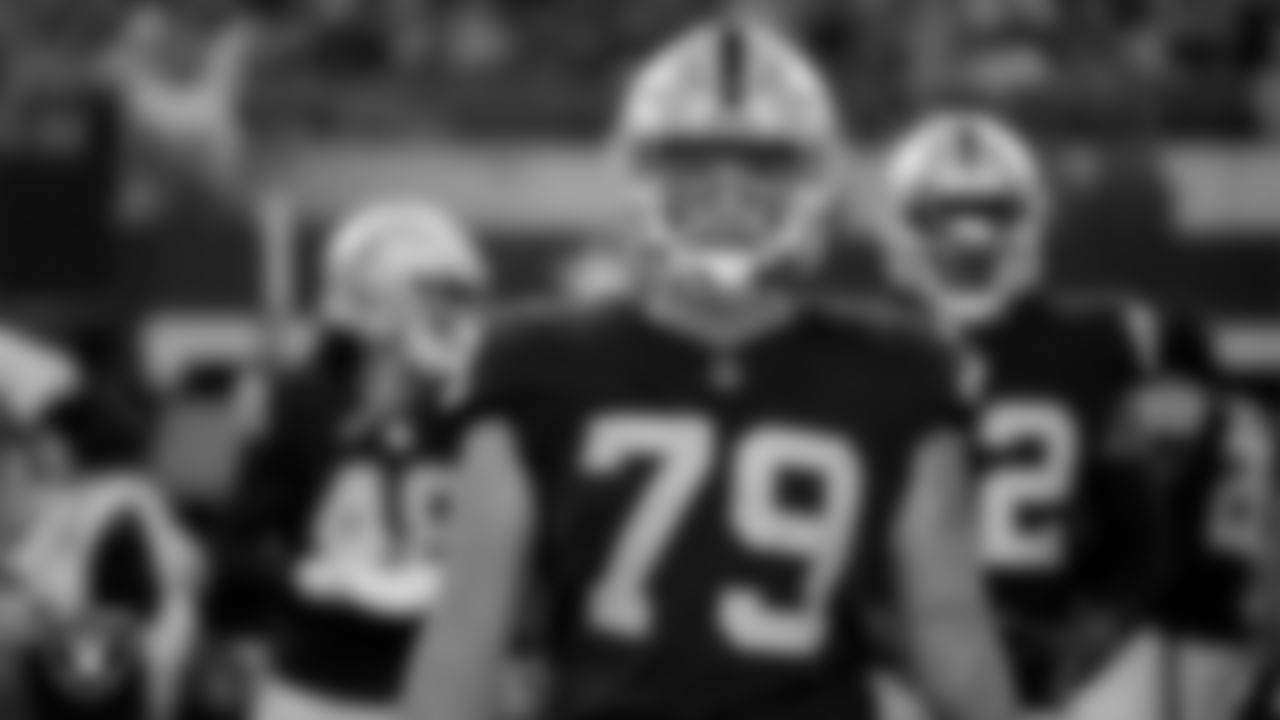 Las Vegas Raiders defensive end George Tarlas (79) on the sidelines before the Las Vegas Raiders' preseason away game against the Dallas Cowboys at AT&T Stadium.