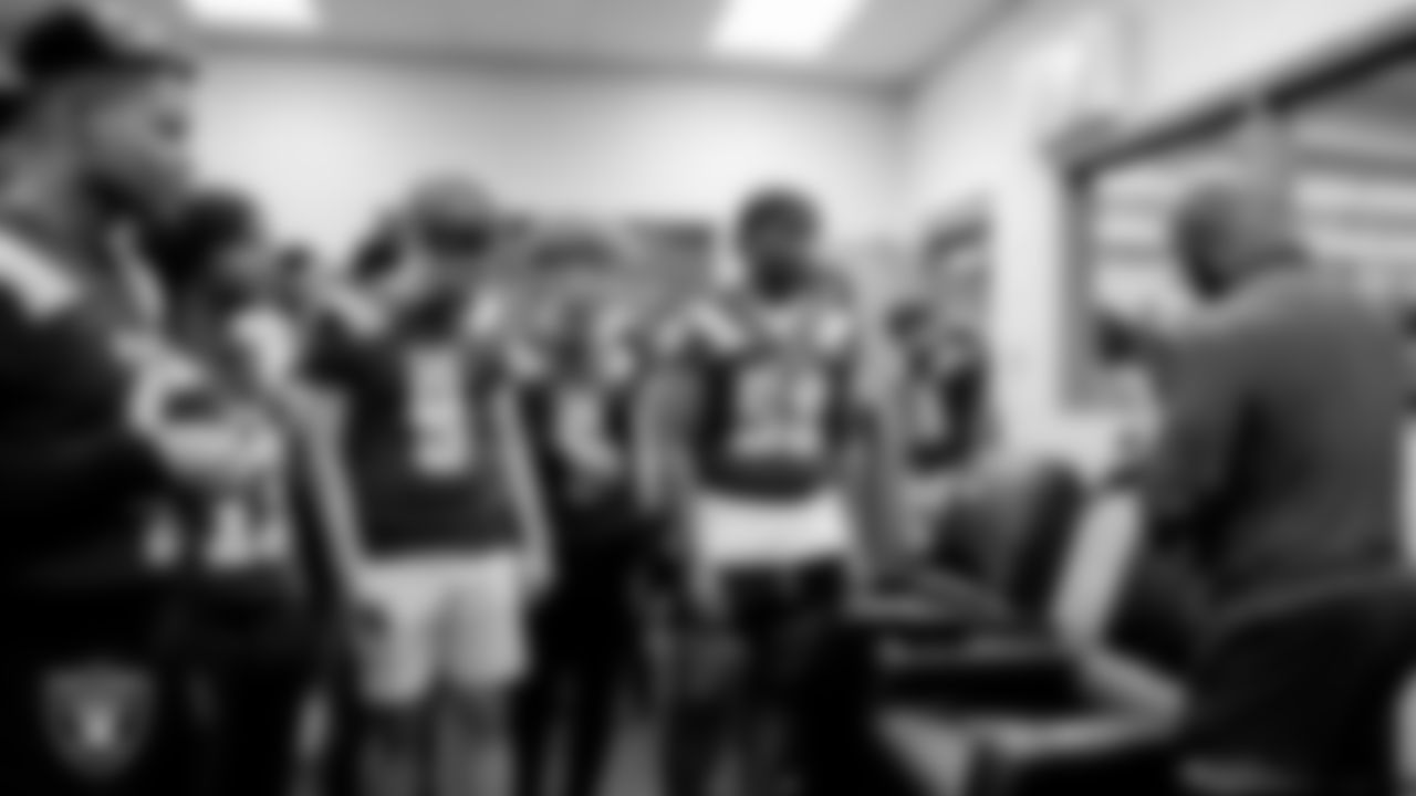 Del Sol Academy student athletes take a look at the DreamSeat recliners and percussion massagers in the new recovery room at Del Sol Academy.