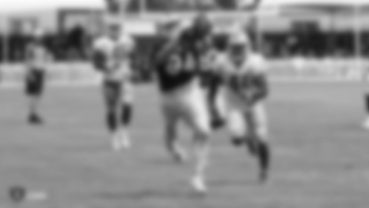 Oakland Raiders tight end Paul Butler (84) with Detroit Lions (41) strong safety Rolan Mulligan on the field for practice at 2018 Training Camp at The Oakland Raiders Napa Valley Training Complex, Wednesday, August 8, 2018, in Napa, California.