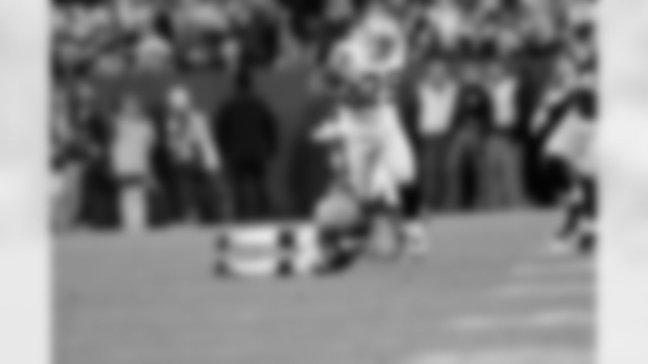 RB Rock Cartwright runs through the tackle.