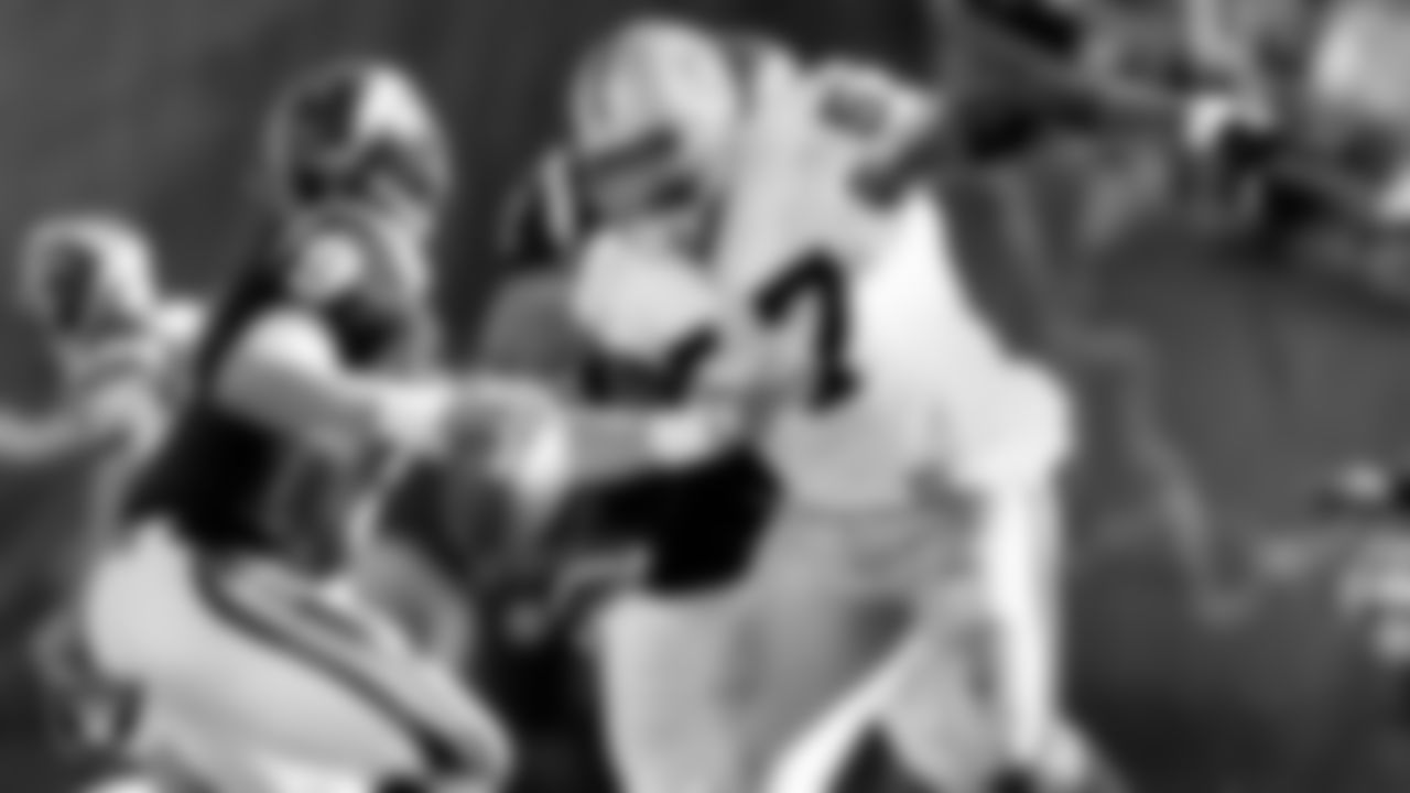 Raiders defensive tackle Roderick Coleman (57) pressures the quarterback during the regular season away game against the San Diego Chargers at Qualcomm Stadium, Saturday, December 8, 2002.