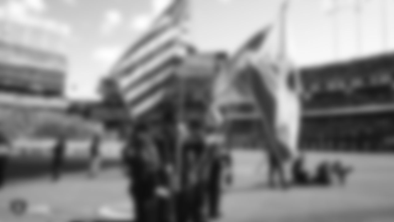 Alameda County Sherriff's Office presents the nation's colors during the national anthem before the Raiders regular season game against the Jacksonville Jaguars.