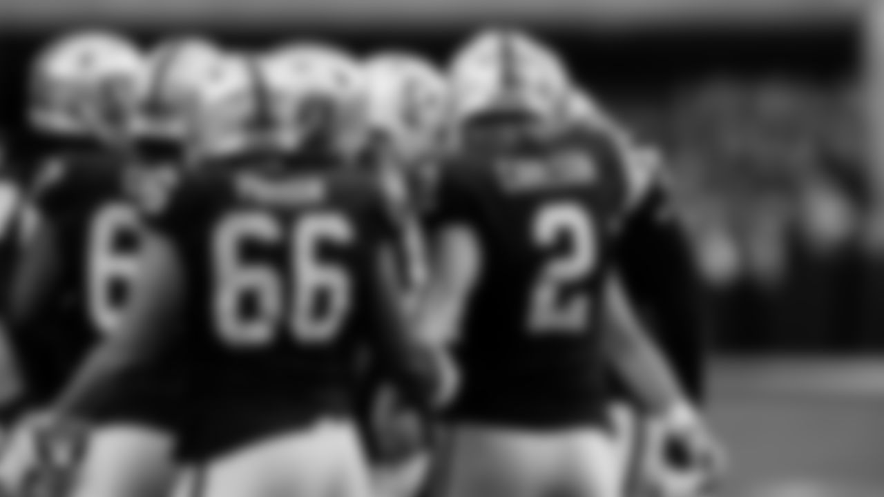 Las Vegas Raiders kicker Daniel Carlson (2) is congratulated by teammates after kicking a PAT during the regular season home game against the Indianapolis Colts at Allegiant Stadium.