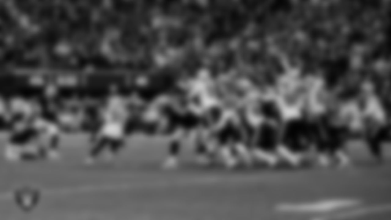Las Vegas Raiders kicker Daniel Carlson (2) kicks a PAT during the regular season home game against the New England Patriots at Allegiant Stadium.