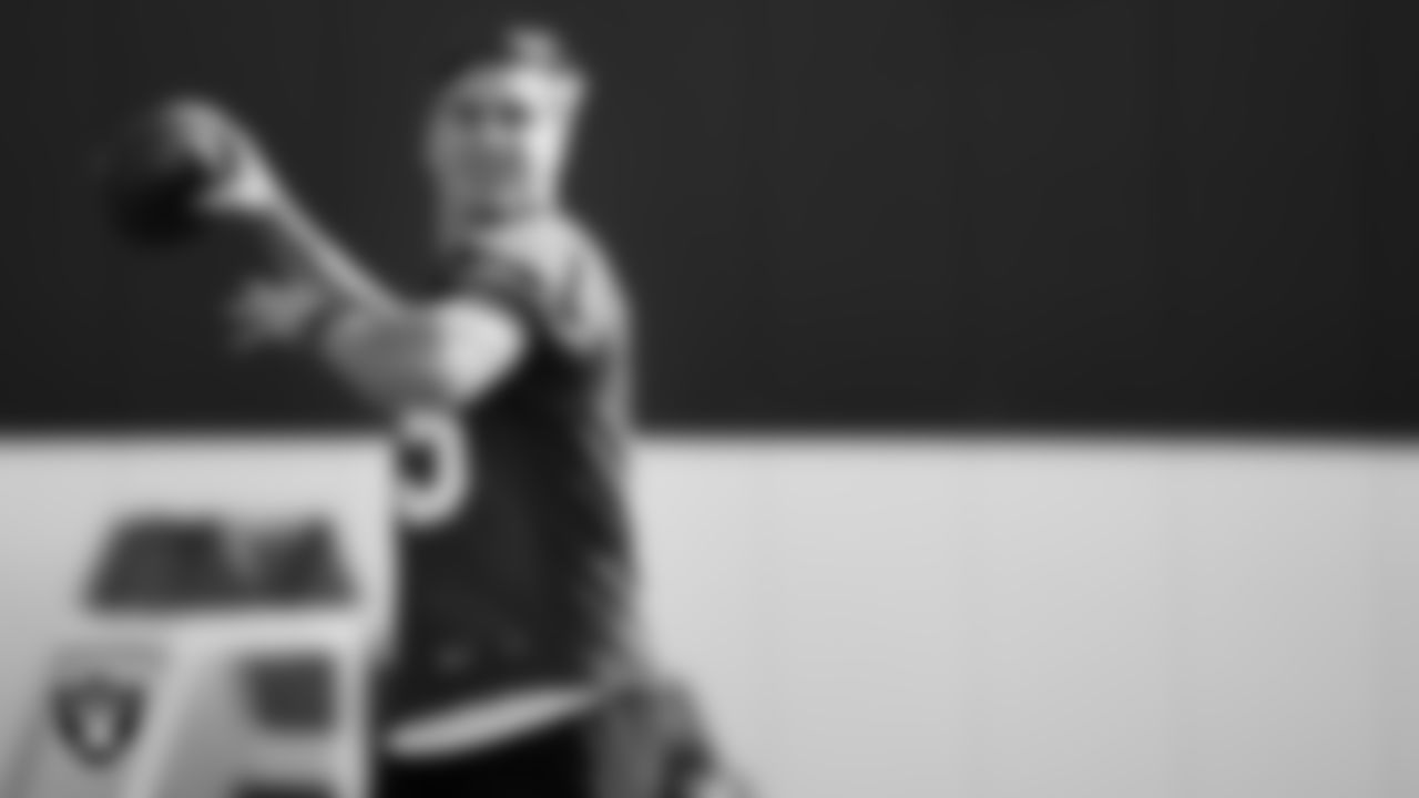 Las Vegas Raiders quarterback Chase Garbers (15) at a workout during phase two of the offseason program.