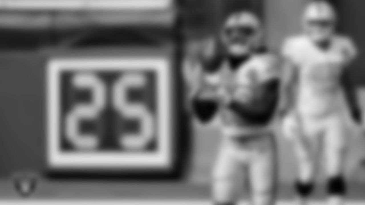 The Raiders warm up before the regular season game against the Los Angeles Chargers at SoFi Stadium.
