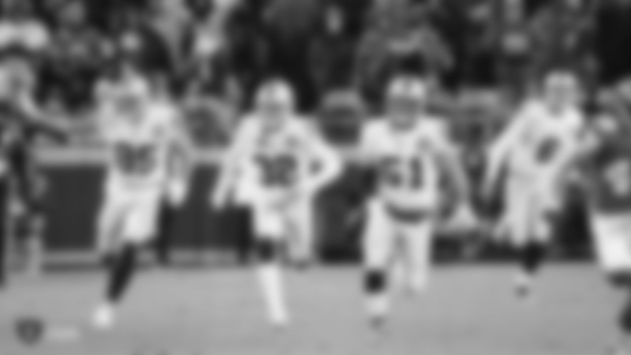 Raiders tight end Derek Carrier (85), safety Dallin Leavitt (32) and linebacker Will Compton (51) during the regular season game against the Kansas City Chiefs at Arrowhead Stadium.