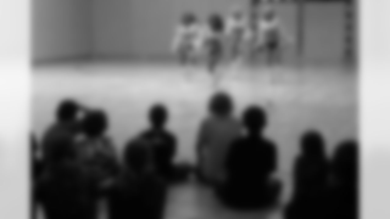 The Raiderettes perform for students during a school visit in Innsbruck, Austria.