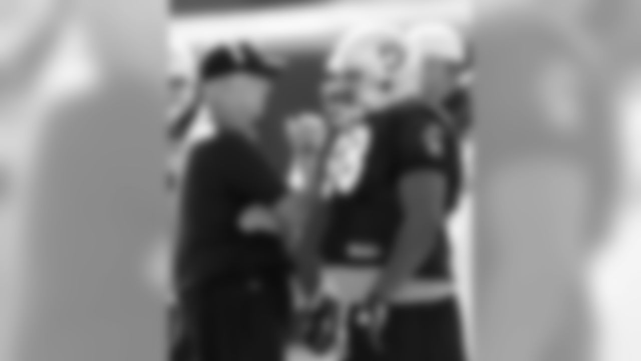 DE Coach Mike Waufle with DT Derrick Hill.