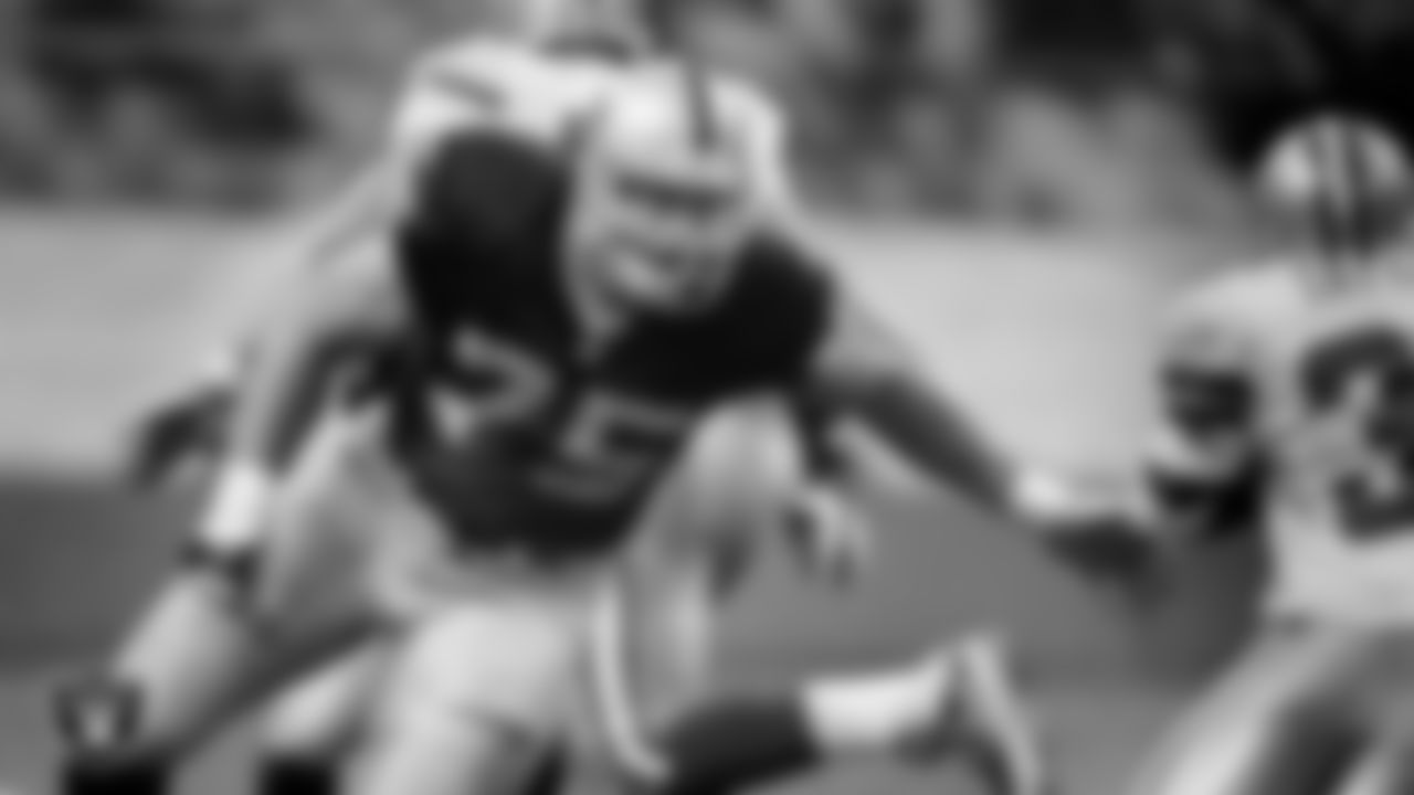Oakland Raiders defensive tackle Chris Cooper (75) goes to make a tackle during the preseason away game against the Dallas Cowboys at Aztec Stadium, Monday, August 27, 2001, in Mexico City, Mexico.