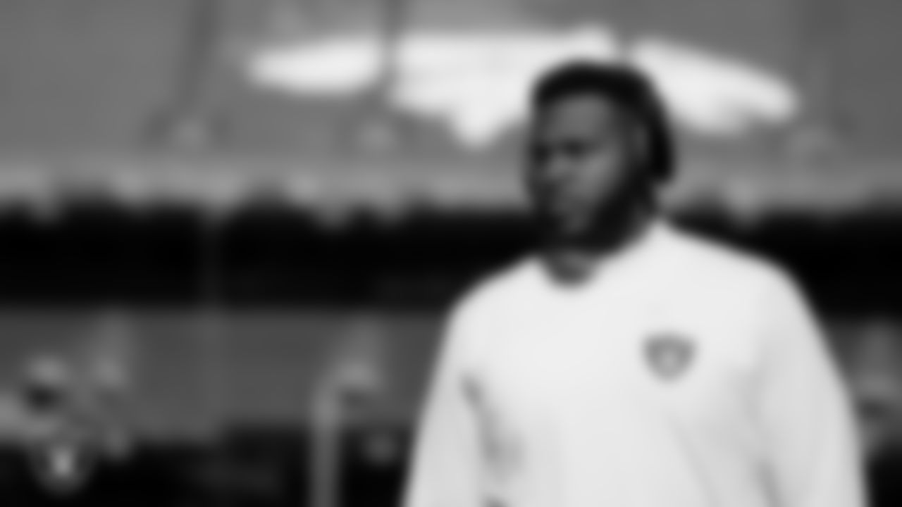 Las Vegas Raiders tackle Thayer Munford Jr. (77) warming up before the regular season away game against the Denver Broncos at Empower Field at Mile High.