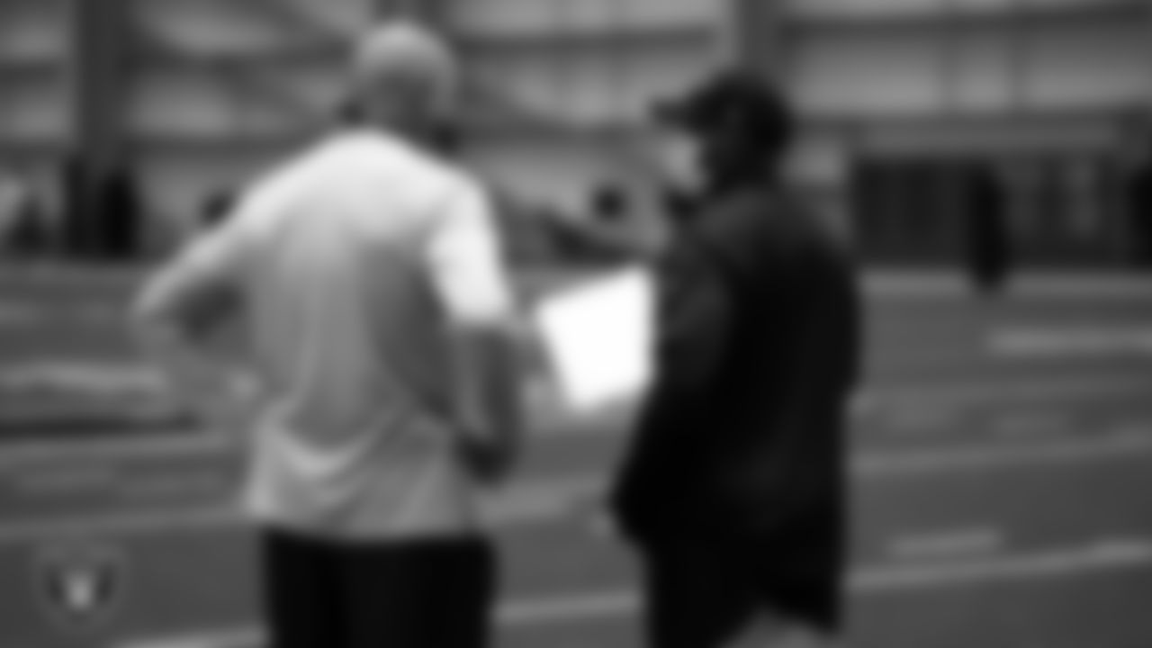 Las Vegas Raiders offensive line coach Tom Cable and running backs coach Kirby Wilson on the field for a walk through at 2020 Training Camp