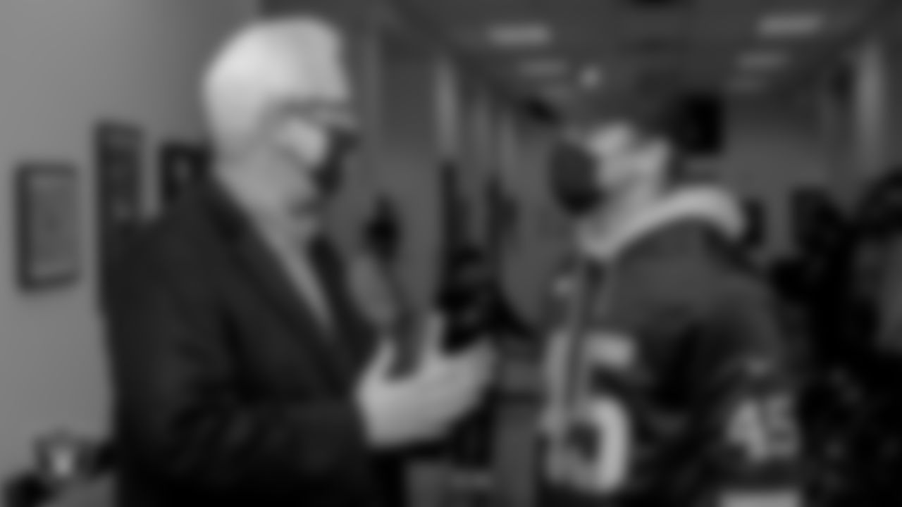 Las Vegas Raiders fullback Alec Ingold (45) talks with Opportunity Village president and CEO Bob Brown participant.